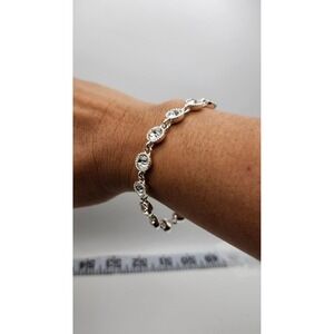 Avon SAQ Faceted Crystal Tennis Bracelet Round 8" Silver Tone‎ Bling Statement